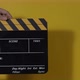 Clapper board. Close up hand and film making clapperboard isolated on background studio. - VideoHive Item for Sale