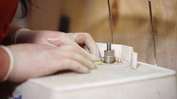 Master Is Processing Edges of Glass Piece By Industrial Polishing Machine alt