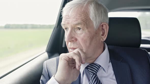 Worrying Politician in Car alt
