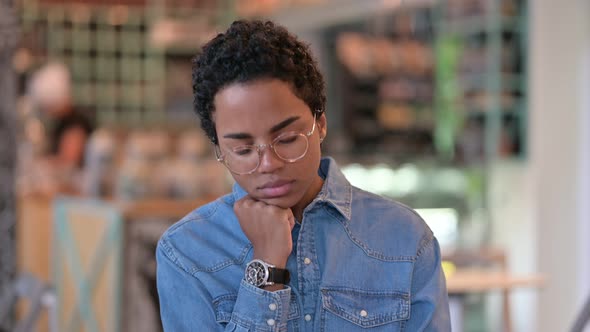Portrait of Sleepy Young African Woman Taking Nap  alt