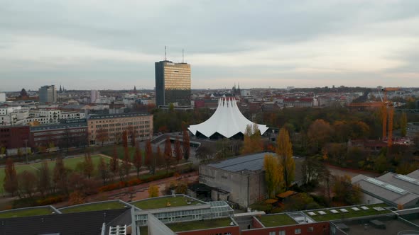Flight Through Part of Berlin Germany with Buildings and View of Tempodrom Event Space Aerial Drone alt