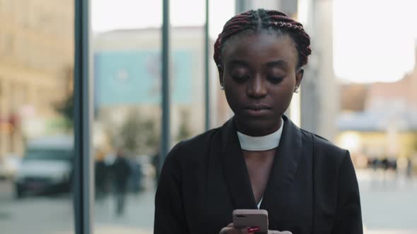 Portrait of Young Serious African American Girl Successful Professional Business Woman Afro Boss alt
