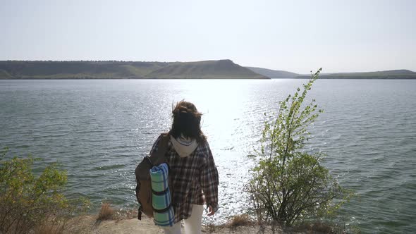 Young Woman Hiking with Backpack Near Dniester Canyon alt
