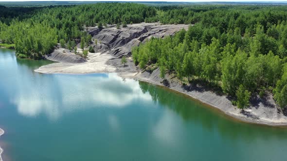 Flying over the lake in the abandoned clay quarry.