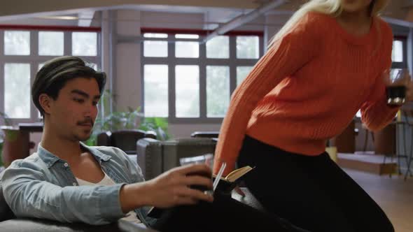 Happy couple spending time together in their house alt