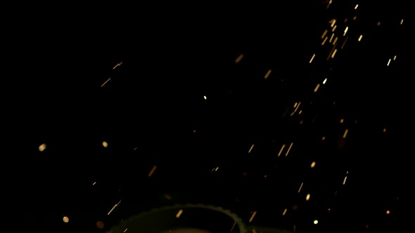 Sparks with gears in ultra slow motion 1500fps on a reflective surface - SPARKS w GEARS  alt