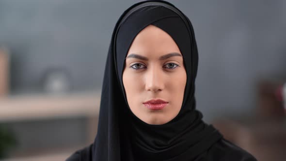 Close Up Face Beautiful Turkish Woman Wearing Black Hijab Posing at Modern Cosiness Home Interior alt