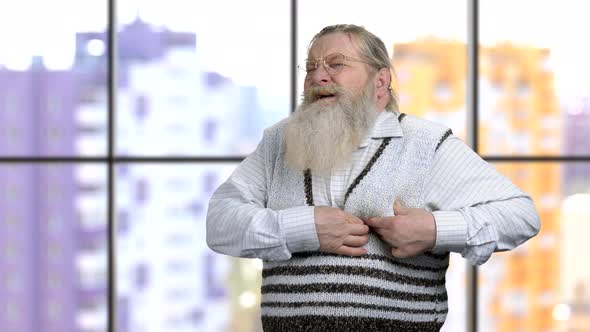 Old Retired Man Suffering From Heart Pain alt