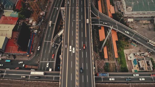 Top Down Cross Traffic Highway with Cars Trucks Aerial
