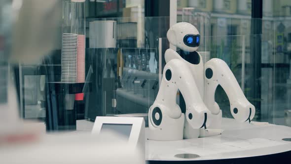 Mechanical Cyborg Is Waiting for Orders in a Cafe. Futuristic Robot, Innovative Technology Concept. alt