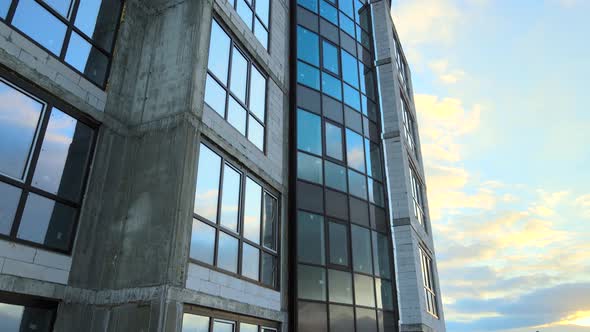 Aerial view of high residential apartment building under construction, Real estate development alt