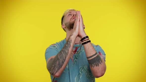 Trendy Stylish Man Praying Looking Upward and Making Wish Asking God for Help Begging Apology alt