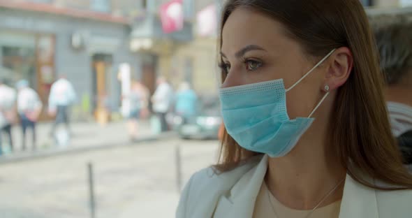 Young Woman in Facial Protective Mask Riding in Public Transport. Woman in Face Mask Sitting By alt