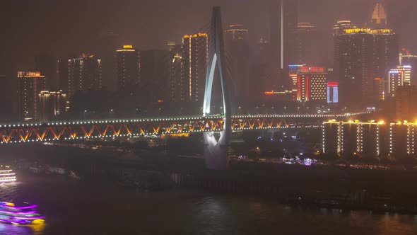 Chongqing City River Cityscape with Bridges Aerial China Timelapse Pan Up alt