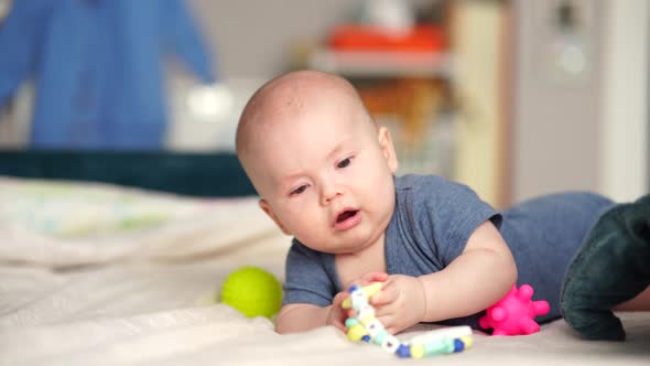 5 Month Old Active Baby Touching Toys