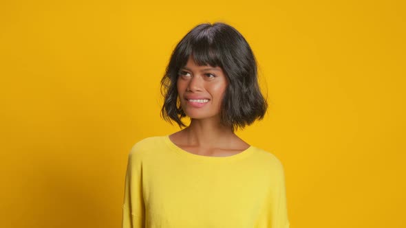 Lovely Woman Bites Lips Has Happy Dreamy Expression Imagines Something Pleasant alt