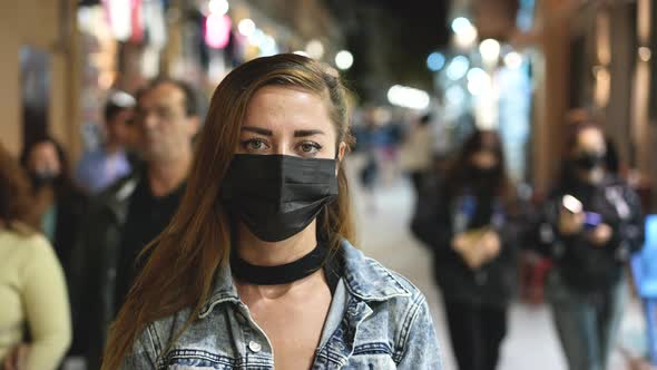Masked Portrait Face of European Woman on Crowded Street During Virus Pandemic