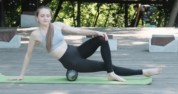 Young Beautiful Girl Does an Exercise with an MFR Video alt