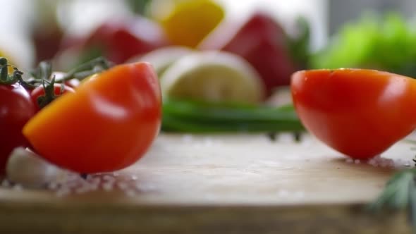 Ripe Tomato Falling Down and Splitting into Two Parts, Stock Footage