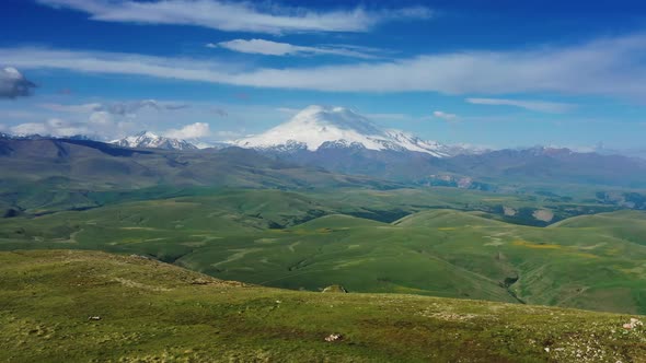 Mount Elbrus and Clouds Caucasus Mountains alt