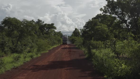 Africa Mali Cargo Truck With Workers On It Aerial View alt
