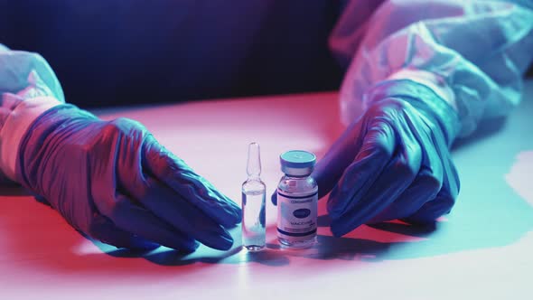 Covid19 Vaccine Nurse Hands Vial Drug Ampoule alt
