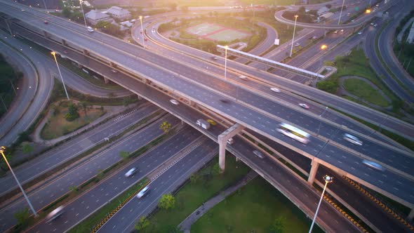 4K : Aerial drone hyperlapse video of elevated toll road junction alt