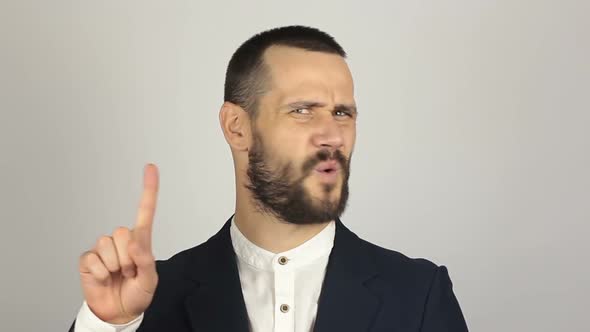Young Handsome Businessman Says No and Shakes His Head Negatively