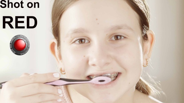 Brushing Teeth With Braces alt