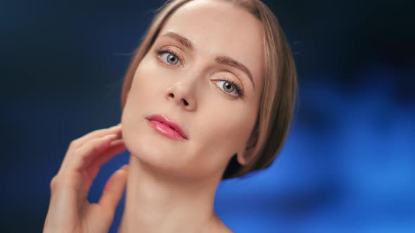 Close Up Blonde Hair Feminine Stroking Chin Tenderness Smooth Skin Enjoying Beauty Treatment alt