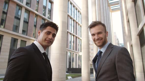 Two Businessmen Looking at Camera alt