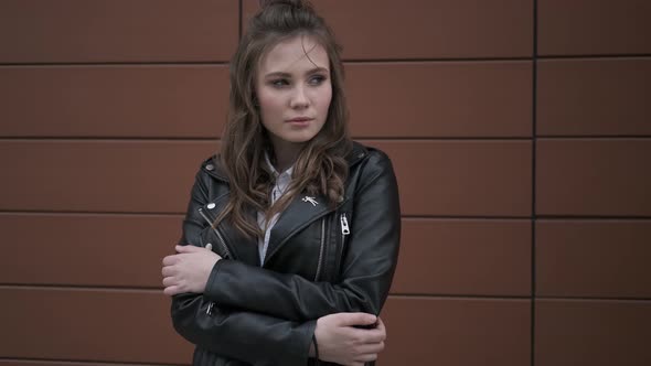 Portrait of a Beautiful Girl in a Leather Jacket alt