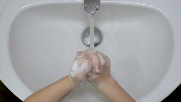 Woman Washes Hands Rubbing Properly And Thoroughly With Soap To Protect Virus alt