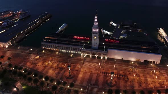 San Francisco aerial drone downtown waterfront at night with city lights