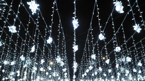 Starry sky Christmas light. The holiday comes to us. Slow motion. Shooting on the Steadicam alt