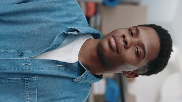 Portrait View Multiracial Man Looking at the Camera While Working in a Clothing Store or Reuse alt