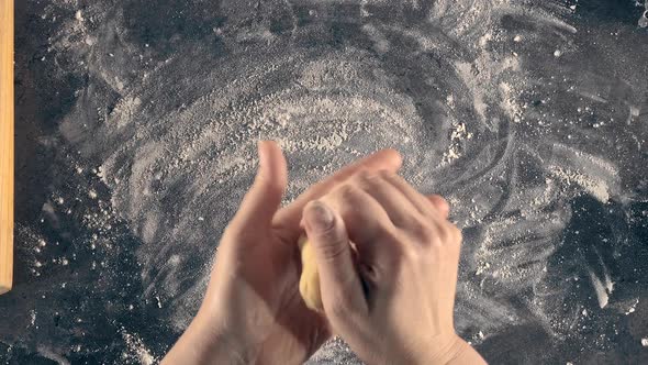 Woman Prepares Butter Cookies at Home in the Kitchen alt