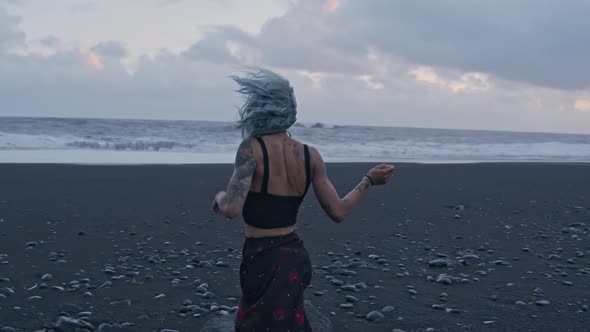Cool Girl Running On Black Beach alt