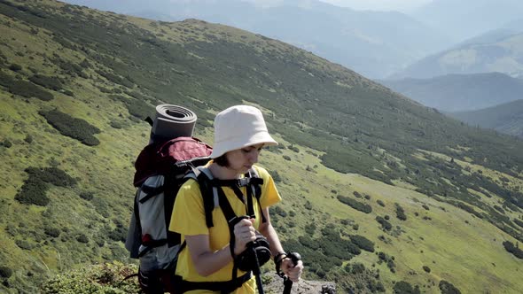 Woman Tourist walking on top of mountain. Hikers travel enjoy life scenic nature landscape alt