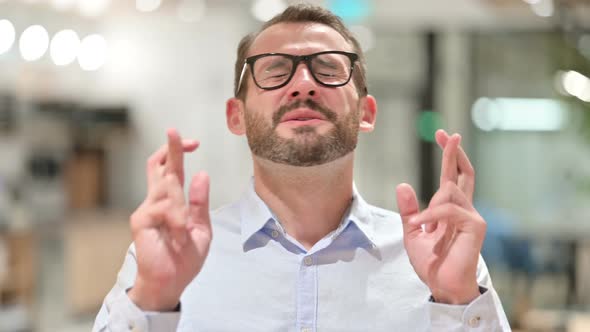 Portrait of Hopeful Businessman Praying, Forgiveness alt