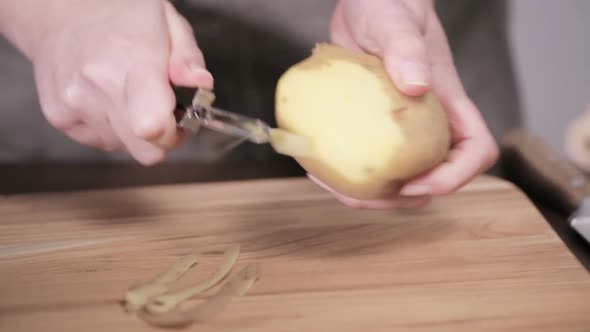 Step by step. Peeling Yukon gold potatoes for creamy mashed potatoes. alt