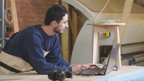 Caucasian Furniture Maker Skillfully Making a Wooden Chair alt