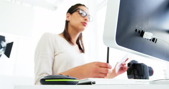 Graphic designer using a graphics tablet alt