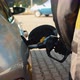 Hand refilling the car with fuel at the refuel station - VideoHive Item for Sale