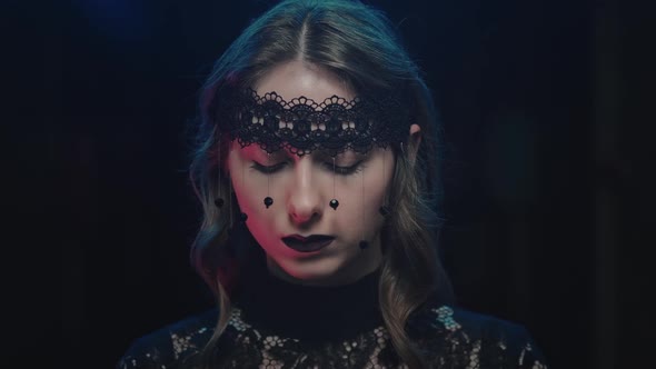 Mystical Female in Black Attire Looking at the Camera Halloween Feast of All Saints Portrait of a alt