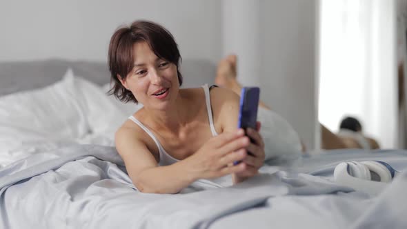 Woman Having Morning Video Chat