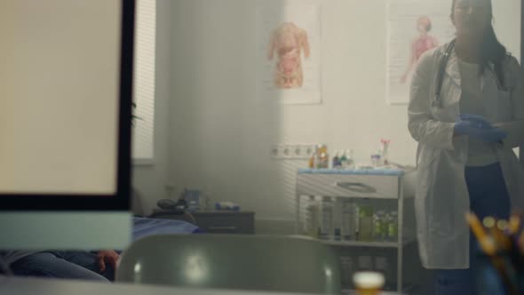 Woman Doctor Working Immunizing Elderly People in Hospital alt