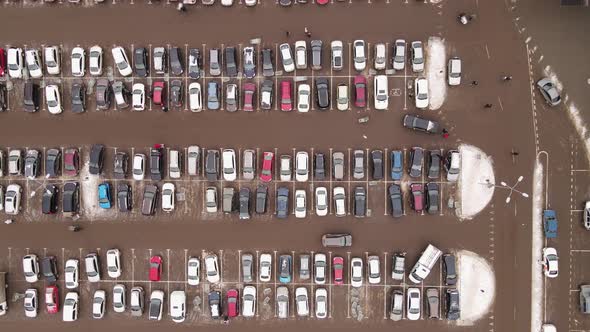 Cars Stand in Straight Rows in the Parking Lot Aerial View alt