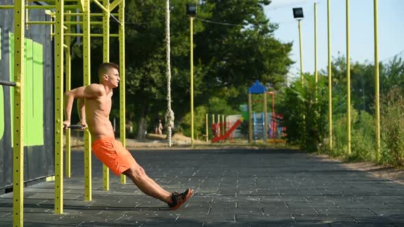 Crossfit Man Doing An Exercise. Close Up