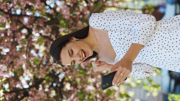 Vertical Video Portrait of Happy Woman Enjoy Success on Mobile Phone